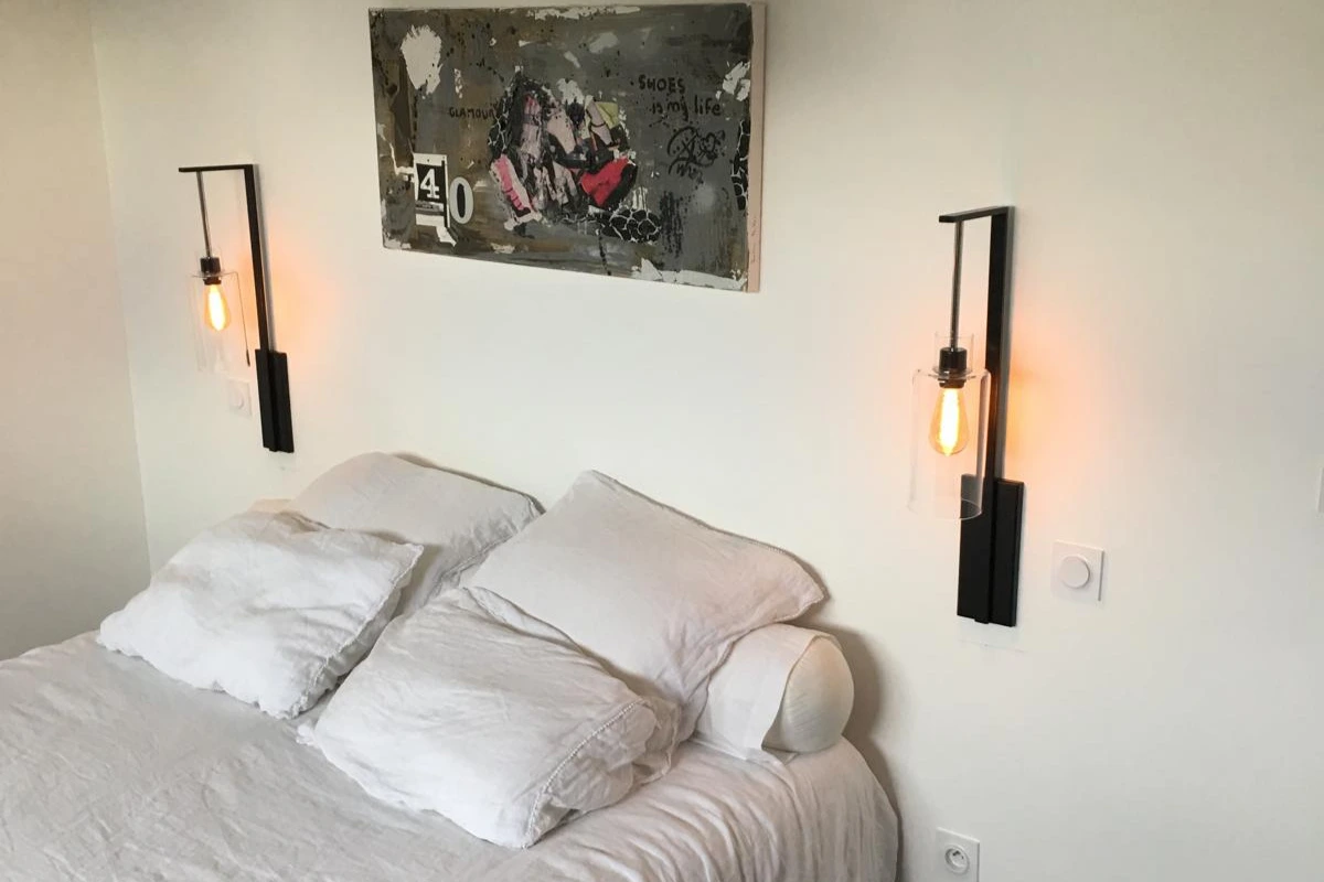Éclairage design tête de lit 